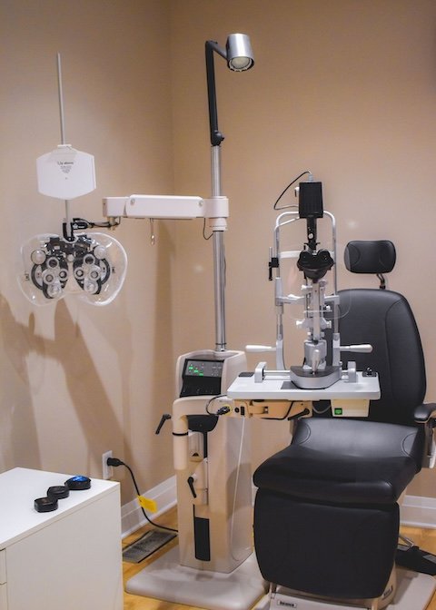 exam room and patient chair showing equipment used by the optometrist